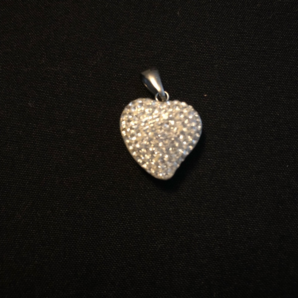 Swarovski heart shaped piece.